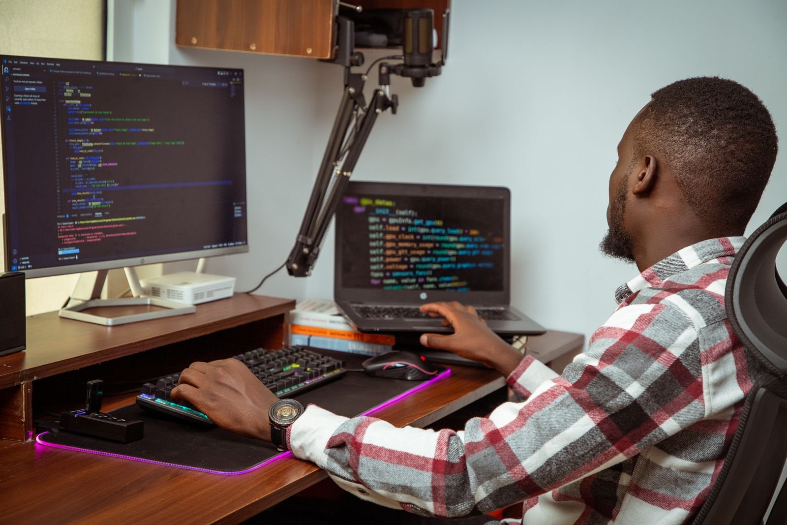 A designer building a digital product at a desk in Nairobi